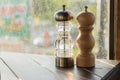 Assortment of spices in glass bottles on wooden background Royalty Free Stock Photo