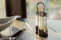 Assortment of spices in glass bottles on wooden background Royalty Free Stock Photo