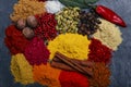 Assortment of spices seasoning on a black stone Royalty Free Stock Photo