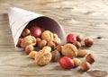 Assortment of tasty nuts in a paper bag Royalty Free Stock Photo