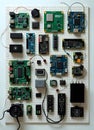 Assortment of various electronic components and circuit boards arranged on a surface Royalty Free Stock Photo