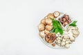 Assortment of various mushrooms - fresh, dried and pickled. Oyster, cremini, porcini and shiitake