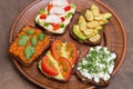 Assortment vegan, vegetarian sandwiches. Healthy homemade sandwich with different vegetables and greens on plate close up