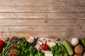 Assortment of vegetables, herbs and spices on wooden table. Royalty Free Stock Photo