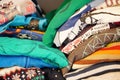 Assortment of vibrant t-shirts arranged in a neat stack