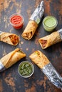 Assortment of wraps Reshmi Tikka, chicken tikka, bhuna, Aloo Corn or potato Corn paratha roll kathi shawarma with dipping sauce