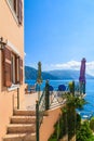 ASSOS TOWN, KEFALONIA ISLAND - SEP 18, 2014: house terrace on coast of Kefalonia island in Assos village. Greek islands are very Royalty Free Stock Photo