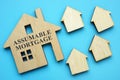 Assumable Mortgage sign on small model of house