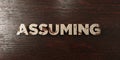 Assuming - grungy wooden headline on Maple - 3D rendered royalty free stock image Royalty Free Stock Photo