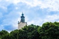 Assumption of the Blessed Virgin Mary Church with Green Colored Cupola Tower of Korniakt with Cross and Dominican Cathedral Dome Royalty Free Stock Photo