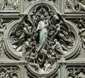 Assumption of the Virgin Mary, detail of the main bronze door of the Milan Cathedral Royalty Free Stock Photo