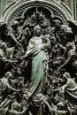Assumption of the Virgin Mary, detail of the main bronze door of the Milan Cathedral Royalty Free Stock Photo