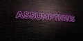 ASSUMPTIONS -Realistic Neon Sign on Brick Wall background - 3D rendered royalty free stock image Royalty Free Stock Photo