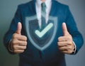 Assurance and confidence, featuring elements like a checkmark, shield, and thumbs up, symbolizing trust, security, and positive Royalty Free Stock Photo