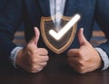 Assurance and confidence, featuring elements like a checkmark, shield, and thumbs up, symbolizing trust, security, and positive Royalty Free Stock Photo