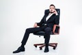 Assured confident business man with beard sitting in office chair Royalty Free Stock Photo
