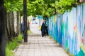 Astara, Iran, May 13, 2017. Woman in hijab walkin on the street of Iran coastal city