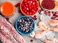 astaxanthin rich food as shrimps, red fish salmon, blueberry, cranberry, red seaweed, caviar, walmars tentacles