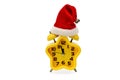 An asterisk Christmas clock shows the remaining time until midnight with a Santa Claus hat,on an white background.Yellow.12,Twelve Royalty Free Stock Photo