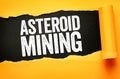 Asteroid mining text on torn paper background, space industry concept showing resource extraction beyond Earth, future technology Royalty Free Stock Photo