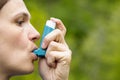 Asthma patient inhaling medication