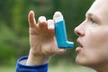 Asthma patient inhaling medication