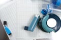 Asthma relief concept, salbutamol inhalers, medication and paper Royalty Free Stock Photo