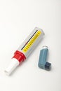 Asthma spray reliever inhaler and a peek flow meter Royalty Free Stock Photo