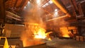 Asting ingots in foundry shop, metallurgical production. Stock footage. Melting steel at the plant, heavy industry and Royalty Free Stock Photo