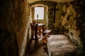 ÃÂ¡astle interiors, brick walls, small bedroom with table, Ruins of Horni Hrad, gothic and renaissance or neo-renaissance fragments