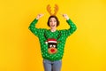 Astonished crazy girl deer green x-mas sweater point finger reindeer headband receive gift present theme costume party