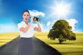 Astonished elegant businesswoman holding binoculars Royalty Free Stock Photo