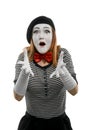 Astonished female mime, isolated on white. Woman, performing a pantomime Royalty Free Stock Photo