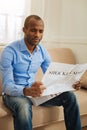 Astonished man reading latest news Royalty Free Stock Photo