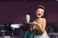 astonished pin up waitress in dress Royalty Free Stock Photo