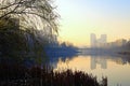 Astonishing morning landscape. Rusanivka canal with embankment and silhouettes of old multi-story houses.