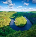 Astonishing morning view of Vltava river horseshoe shape meander from Maj viewpoint. Breathtaking summer scene of mountain canyon Royalty Free Stock Photo