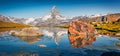 Astonishing summer scene of Stellisee lake. Panoramic morning view of Matterhorn Royalty Free Stock Photo