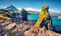 Astonishing summer view of small fishing village at the foot of Mt. Stapafell - Arnarstapi or Stapi.