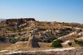 Astonishing view of autumn nature landscape of Cappadocia. Amazing shaped sandstone rocks with autumn colored leaves on the trees Royalty Free Stock Photo