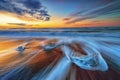 Astonishingly beautiful scenery of the sandy beach and the sea with breathtaking clouds in the sky Royalty Free Stock Photo