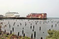 Astoria, Oregon, 9/16/2018, Royal Caribbean`s Explorer of the Seas cruise ship docked along side the Cannery Pier Hotel & Spa Royalty Free Stock Photo