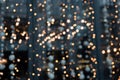 Astract nightlife background. Blurred golden garland blur bokeh, defocused pattern. City lights Royalty Free Stock Photo