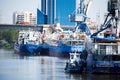 Astrakhan, Russia - 08.12.2020: Cargo ships stand in the port of Astrakhan on the Volga river Royalty Free Stock Photo