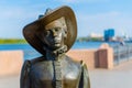 Astrakhan, Russia - October 06, 2019: Sculpture Lady with the Dog. Monument is on the Volga embankment