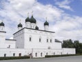 White Orthodox Church with black domes in summer Royalty Free Stock Photo