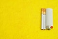 An astray with cigarettes and a ligther Royalty Free Stock Photo