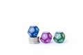 Astrological dices fortune telling divination dice on coin stack isolate on white background