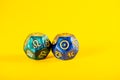 Astrology Dice with zodiac symbol of Leo Jul 23 - Aug 22 and its ruling celestial body the Sun Royalty Free Stock Photo