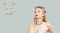 Astrology and horoscope, Taurus Zodiac Sign. Beautiful with long hair and horns Royalty Free Stock Photo